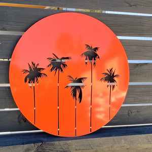 Palm tree orange wall decor by LisaSarah 
steel Designs on black fence in NZ