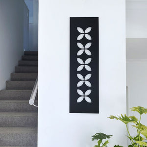 Large Pacifica Frangipani Wall panel in front entrance in home in New Zealand