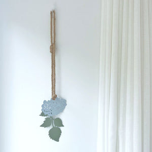 Pale blue wall decor in lounge. 